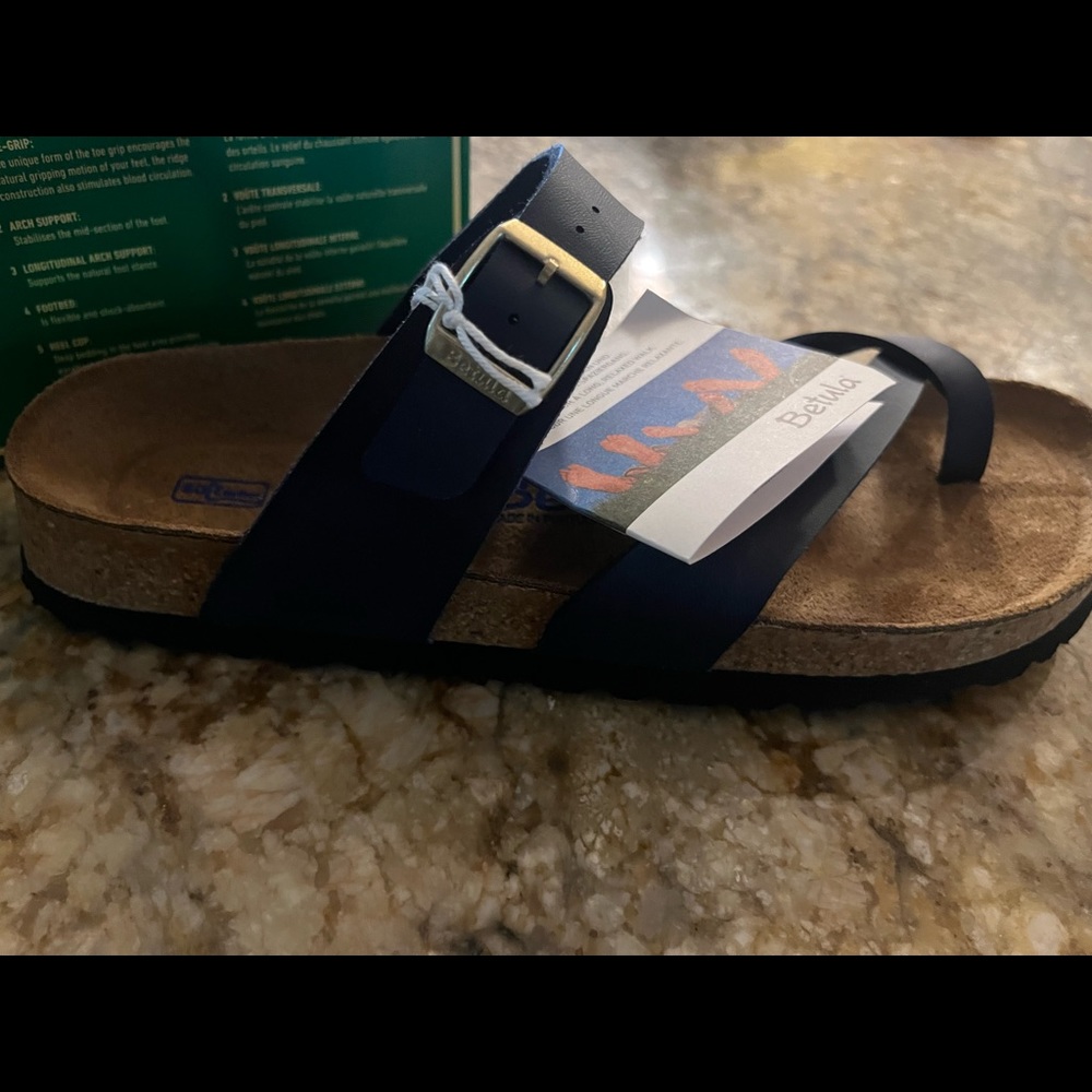 Womens size 10-10.5 slide. Mayari Blue Leather Thumb Loop. Never worn once.